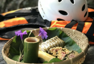 Guide leading the group over creek rocks and pools | Taiwan Travel, Tour & Journey