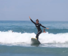 Surfer riding a wave at Jiqi Beach | Taiwan Travel, Tour & Journey